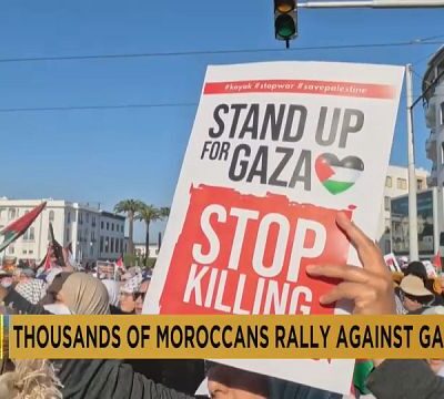 Moroccans wave Palestinian flags at a demonstration in support of Gaza