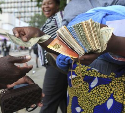 Zimbabwe unveils new currency as depreciation, inflation stoke turmoil