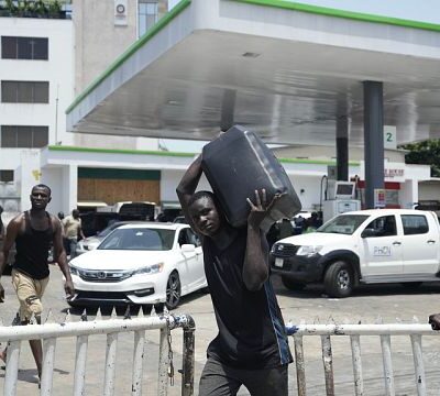 Faced with a shortage, Nigerians queue for hours for petrol as prices soar