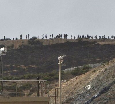 Spain’s Ceuta stretched by Moroccans eager to reach Europe