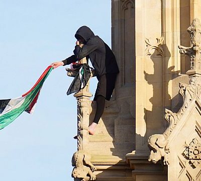 Man descends Big Ben tower after climbing with Palestinian flag