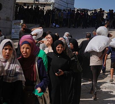 Gaza residents welcome rare organized aid delivery after months of chaos and hunger