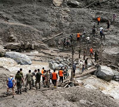 Over 200 dead as flash floods devastate India and Pakistan