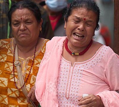 Families hold vigil in Nepal as death toll from protests rises