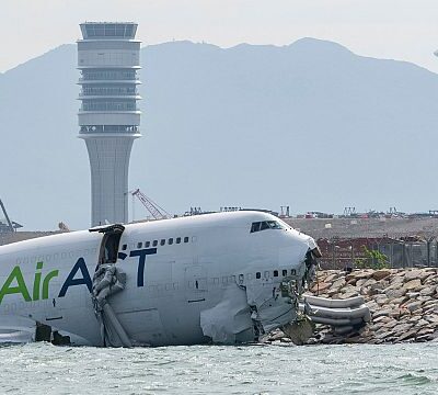 Cargo plane skids off Hong Kong runway, killing two airport workers