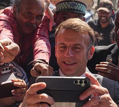 Macron returns to Africa, starting tour in Mauritius with promise of “win-win” ties