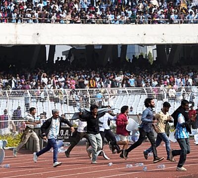 Messi’s tour of India gets off to chaotic start as angry fans storm field