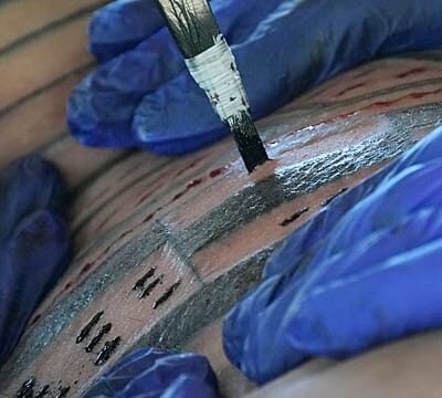 Researchers find evidence of youngest-ever children tattooed