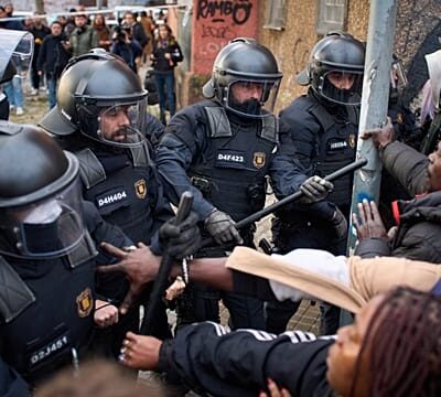 Spanish police evict hundreds of mostly illegal migrants living in a squat