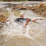 South African politician takes dip in pothole to show city management failures